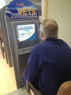 A man using a Vets Connected kiosk